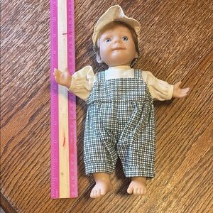 Adorable Baby Doll with Checkered Overalls